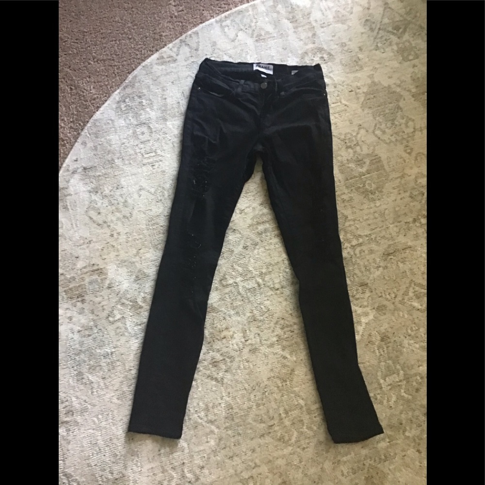 Frame black distressed skinny jeans